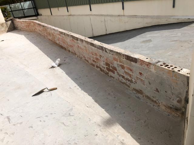 On-site inspection of water damage before waterproofing repairs